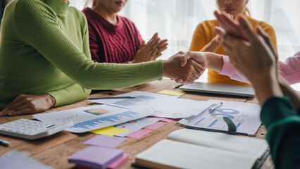 Shaking hands, Employees of the company receive auditing of accounting information. Help check...