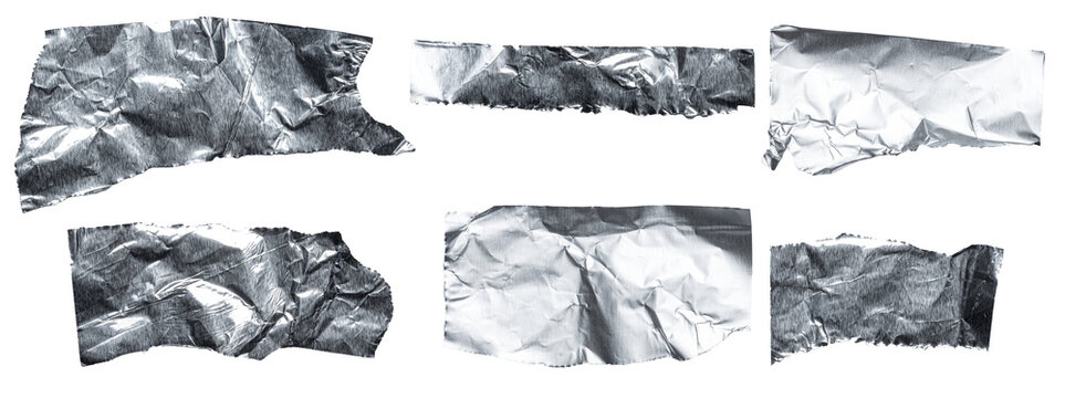 Set collection of torn and ripped crumpled strips of bright shiny metallic aluminium foil, isolated on white or transparent background