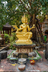 Chiang Mai, Thailand: The Gold four-faced statue of the Hindu deity Brahma at the Buddhist temple Wat Lok Molee.