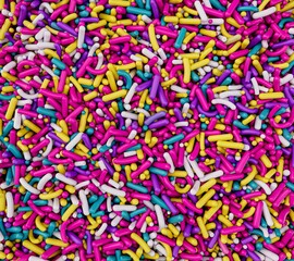 3d rendering of colorful and bright sugar sprinkle dots
