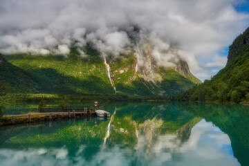The place is called Kjenndalsstova, Turquoise lake Lovatnet and Kjenndalsbreen glacier, Norway	