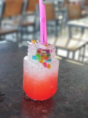 cocktail with ice and straw