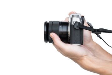 Hand holding vintage camera shooting side view isolated on transparent background