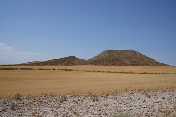 Obraz na płótnie Canvas Deserted area landscape with bare hills