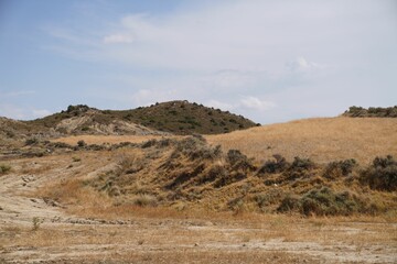 Deserted area landscape with bare hills