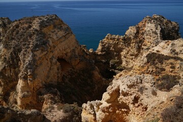 Scenic View of Praia do Camilo beach of blue water in Lagos, Portugal