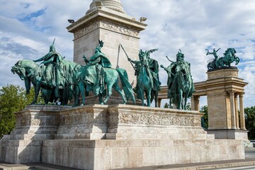 Millennium Monument in Heroes' Square in Budapest with a cloudy sky in the background, Hungary
