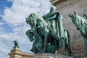 Millennium Monument in Heroes' Square in Budapest with a cloudy sky in the background, Hungary