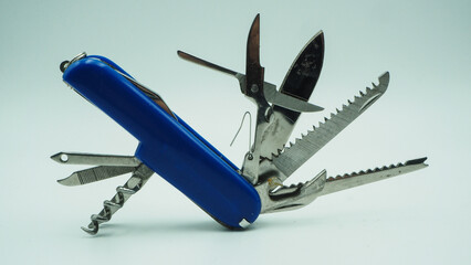Multi-purpose blue handle on a white background
camper knife