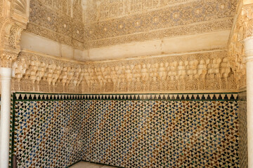 Alhambra, Detailed background of the Alhambra Palace with intricate tile patterns on the wall and Arabic writing in the middle. ceramic wall