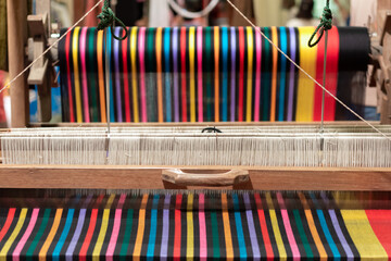 The yarn prepared inside the weaving machine is preparation for weaving local fabrics because local...