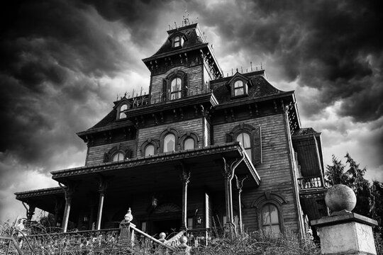 Abandoned wooden house in cloudy weather. Horror house