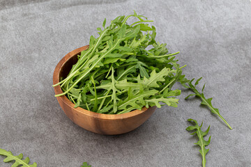 Fototapeta na wymiar Green fresh rucola or arugula leaf isolated
