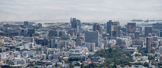 Obraz premium downtown tall buildings and harbor docks aerial cityscape, Cape Town