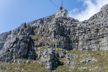 Fototapeta premium cable car upper station on steep cliffs of eastern slopes of Table Mountain, Cape Town