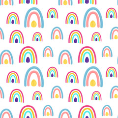 Seamless childish pattern with hand drawn rainbows. Creative kids texture for fabric, wrapping, textile, wallpaper. Vector illustration.