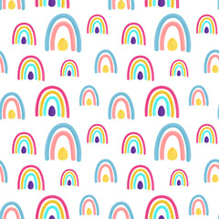 Seamless childish pattern with hand drawn rainbows. Creative kids texture for fabric, wrapping, textile, wallpaper. Vector illustration.