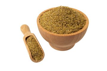dried common chamomile flowers in latin - Matricaria chamomilla in wooden bowl and scoop isolated on white background. Medicinal herb.