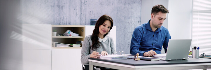 Chartered Accountant In Office With Calculator