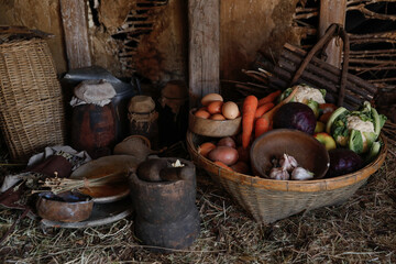 A traditional basket of fresh fruit and vegetables, organic products and eggs. Countryside produce, free range and healthy food, natural products.