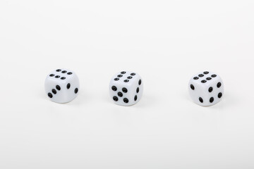 Set of Three White Dice with Six Points Up on White Background - Perfect for Board Games and Casino Nights