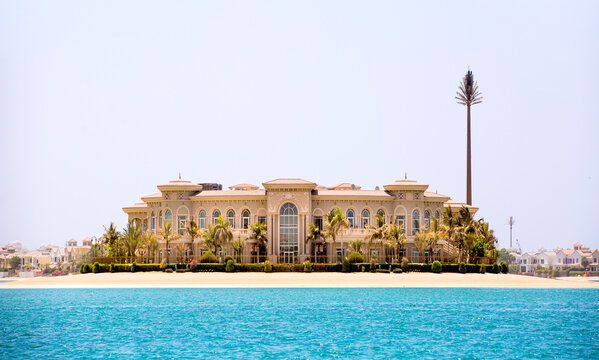 Dubai, UAE.  Water side villa with white sand beach view from the boat