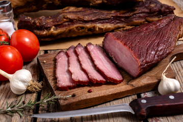 Dried meat on a wooden cutting board