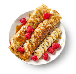 freshly baked crepes with fresh fruits and caramel sauce