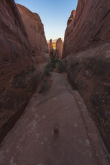 hiking the broken arch trail in arches national park, utah, usa