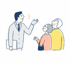 シニア夫婦に説明しているビジネスマン