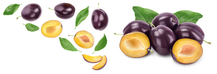 fresh purple plum and half with leaves isolated on white background with  copy spase for your text. Top view. Flat lay