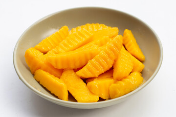 Sweet yellow mango fruit slices