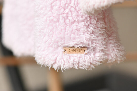 PARIS - FRANCE - 05 March 2023 - Kenzo label on a jacket for a girl. A luxury fashion brand