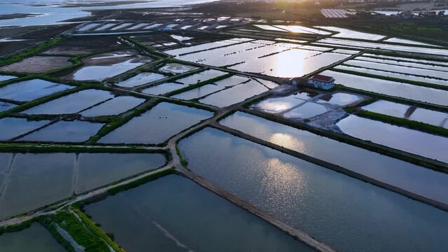 Aerial view from a drone of the landscape of marshes and salt flats of the Ria Formosa Natural Park. Atlantic Ocean. Algarve. Portugal. Europe