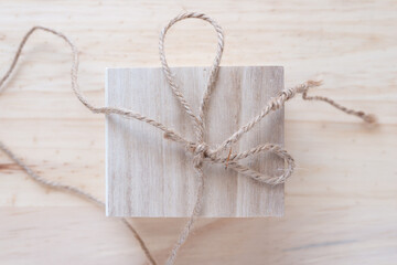 twine knot on wood box and surface