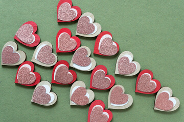 Naklejka premium paper hearts on wood hearts
