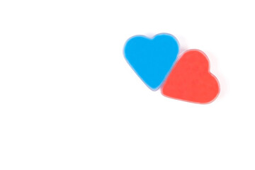 Red and blue hearts isolated on white background. Valentine's day, relationships and love concept, Top view, close up