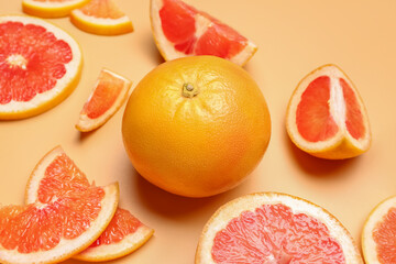 Composition with ripe grapefruit on color background, closeup