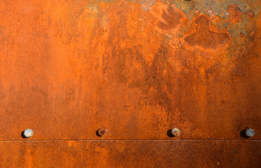 Grunge rusty metal texture with rivets background with space for text or image