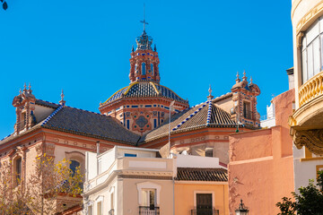 Fototapeta premium El Divino Salvador church with historic buildings in the foreground