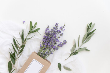 Lavender product presentation. Lavender flowers on a white background. Top view concept.