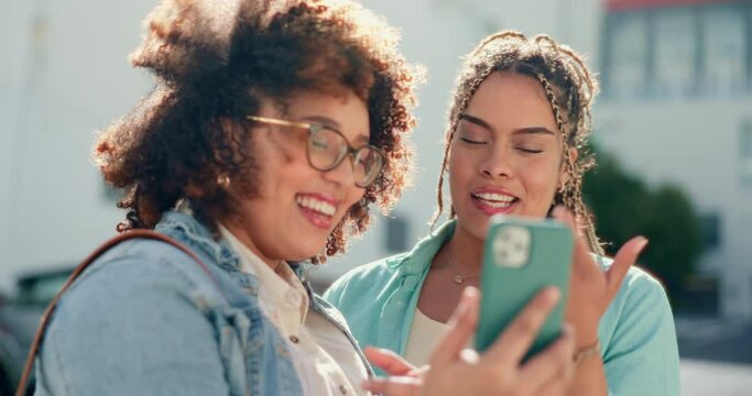 Happy, phone and friends in a city online for gps, location or app against an urban background. Smile, women and smartphone outdoors, talk and searching, browsing or share social media meme in London