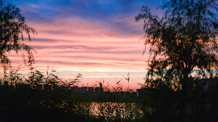 Beautiful burning clouds under the afternoon sunset