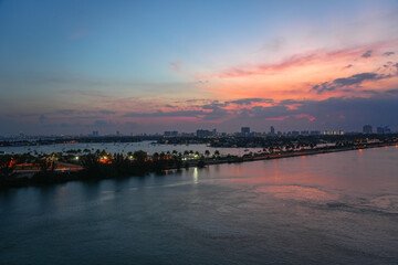 landscape of Miami port before sunrise, tropical seacoast under twilight