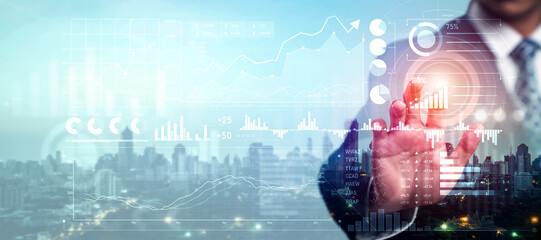 Businessman analyst working with digital finance business data graph showing technology of...