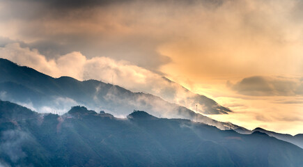 The fanciful beauty of clouds in the mountains in Ta Xua also known as: the back of a dinosaur in...