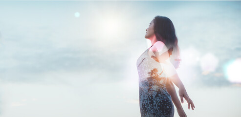 Double exposure. woman and free bird enjoying nature on sunset background, release, freedom,...