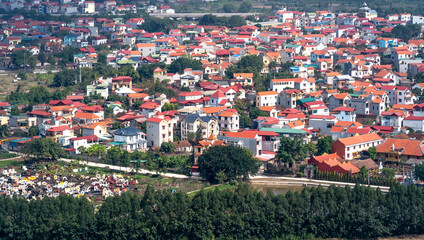 Fototapeta na wymiar An angle of Ecopark urban area viewed from above in Ecopark Urban Area Van Giang, Hung Yen, Vietnam - This is an ecological urban area with many forests and lakes surrounded about 20km