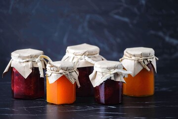 Homemade apricot jam and strawberry jam