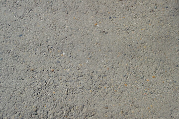 Background texture of gray asphalt. Closeup road surface. Gray road for background or texture